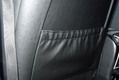 Перетяжка кармана переднего сиденья кожей в Порше Кайен