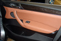 Перетяжка коричневой кожей пассажирской двери BMW X3