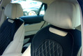 Перетяжка передних подголовников BMW X6 бежевой кожей
