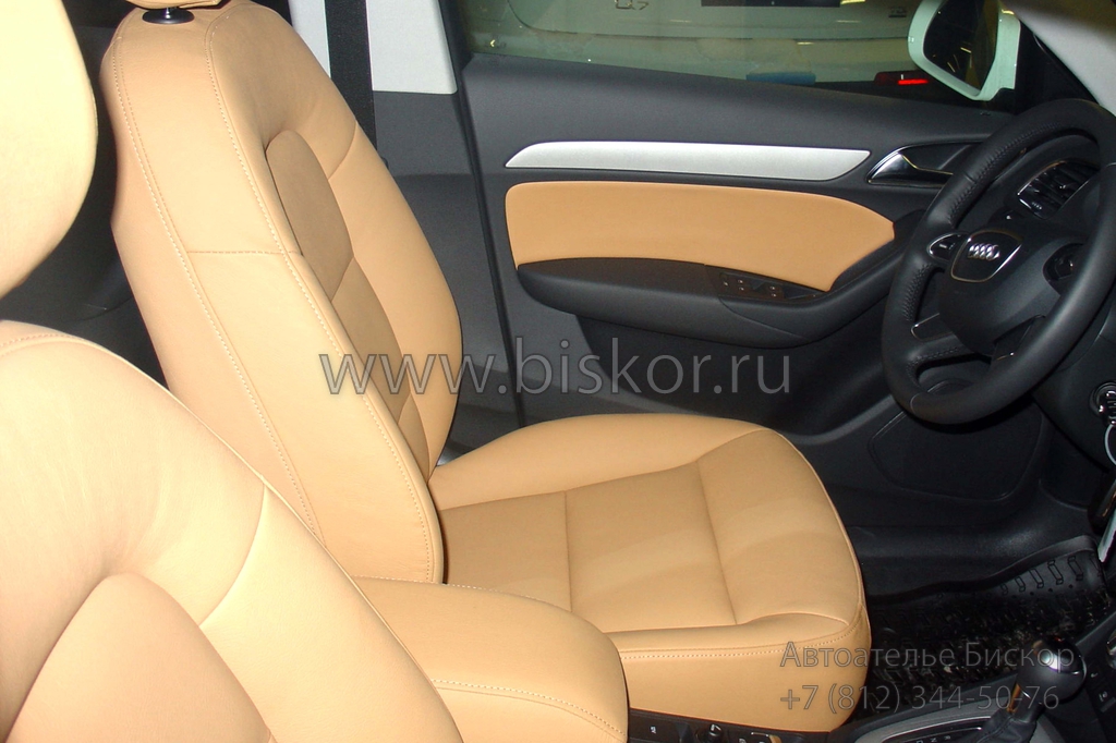 Перетяжка коричневой кожей салона Audi Q3