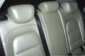 Перетяжка заднего дивана Audi Q3 серебристой кожей